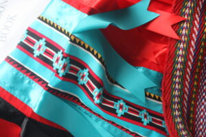 My Métis ribbon skirt, red and turquoise blue